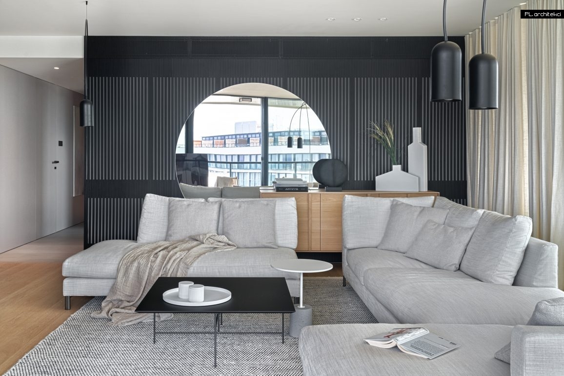 minimalistyczne wnętrze design apartament nam morzem biel biały czerń czarny drewno kołobrzeg plarchitekci
